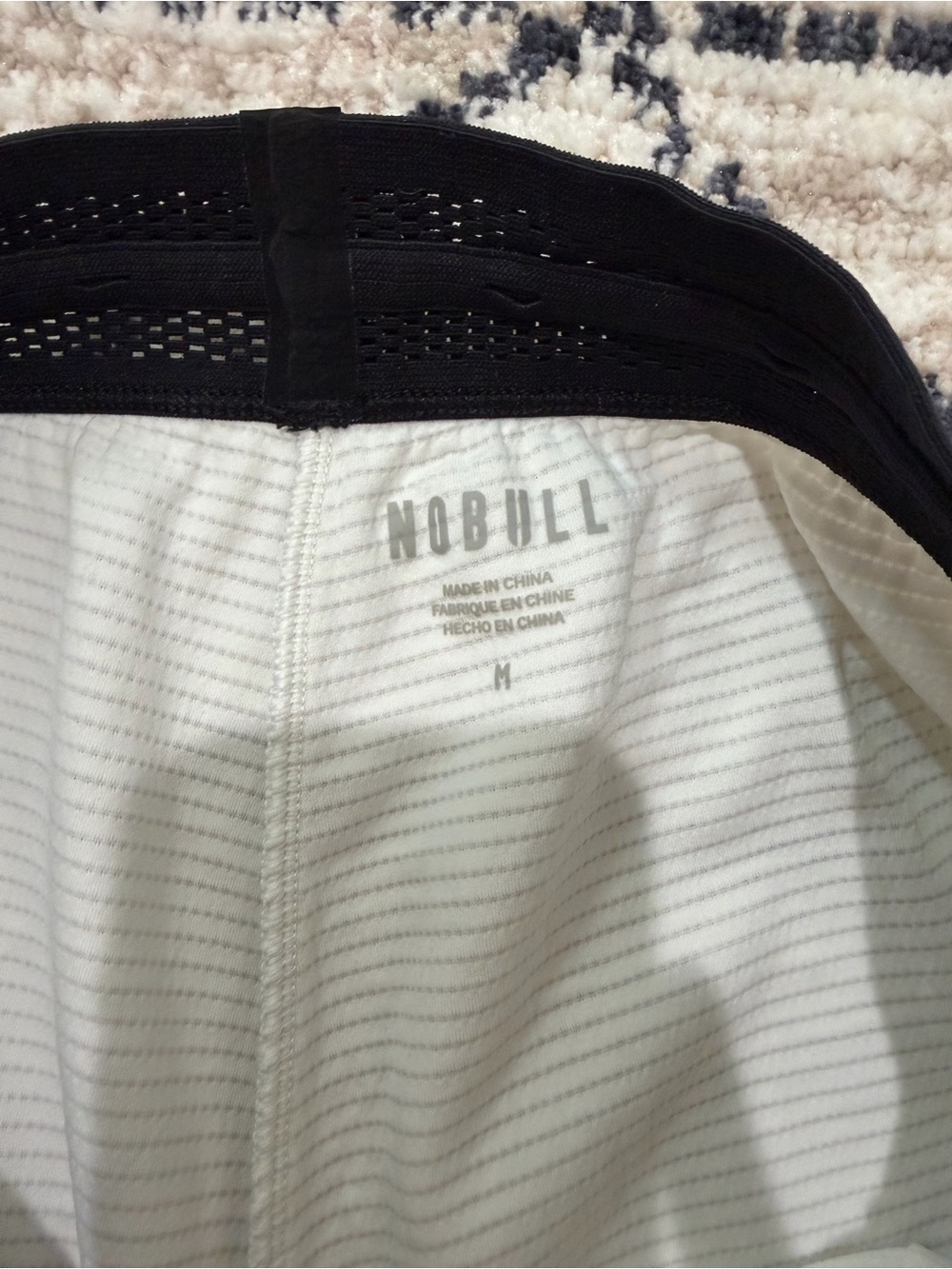NOBULL Men's White/Bone Performance Shorts with Black Waistband - Picture 2 of 3